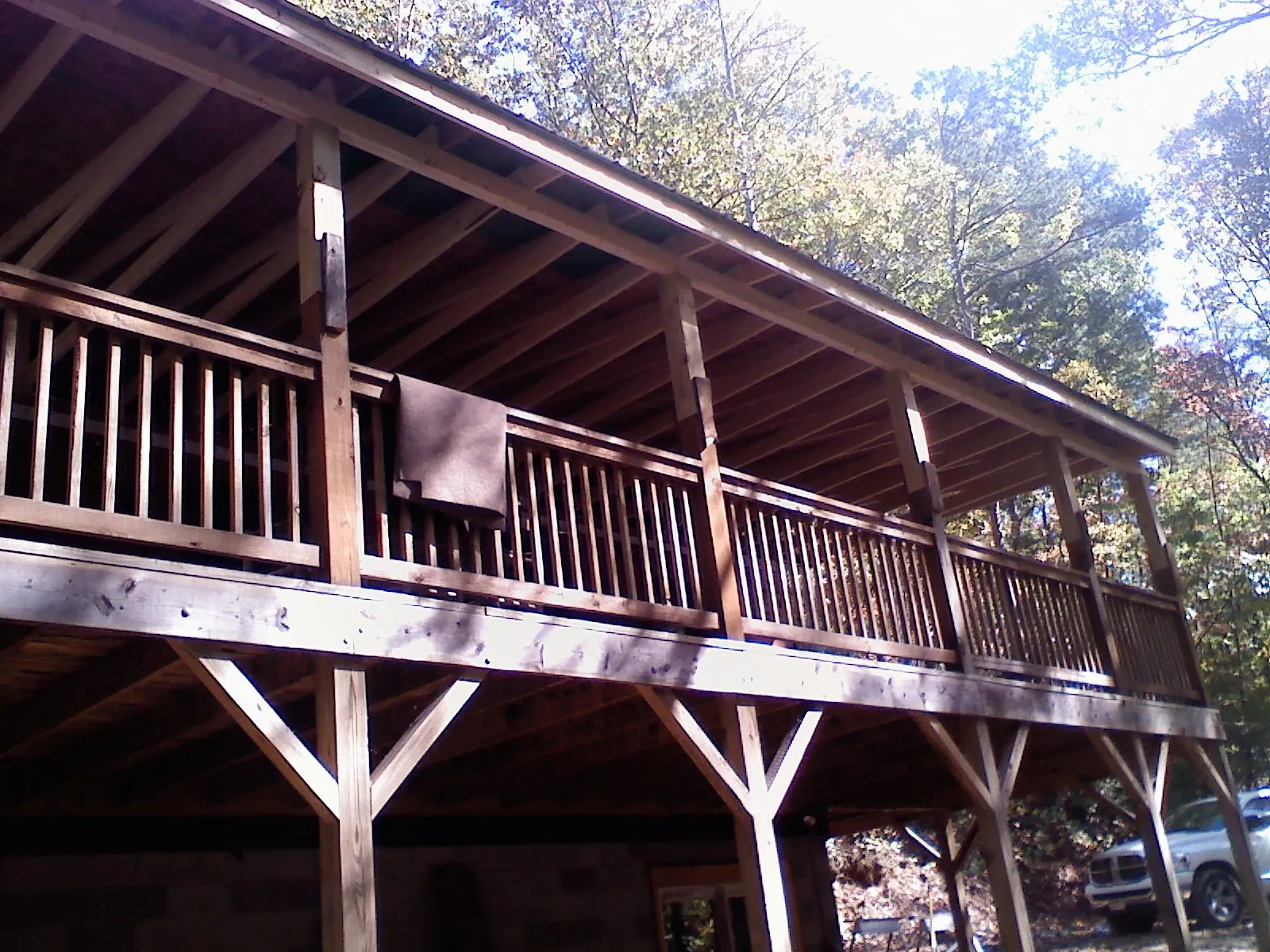 Timber framing under a new elevated porch and deck — Roof Leak Repair in Chillicothe by Roofing Brothers